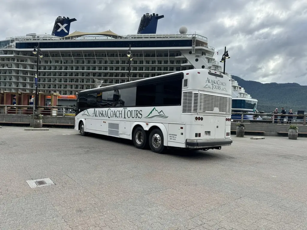 Close view of the stacked balconies and lifeboats on the side of a cruise ship docked in Juneau