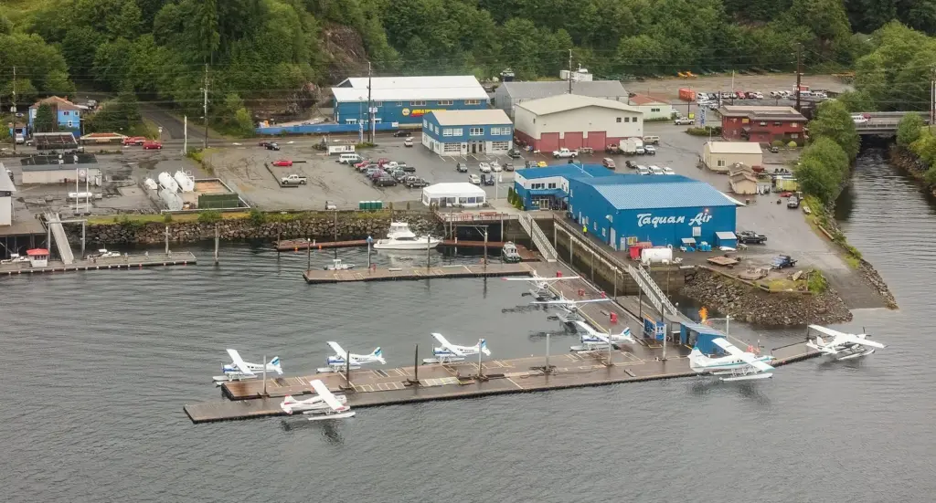 Floatplanes tied up at a floatplane dock on the Ketchikan waterfront, seen from above